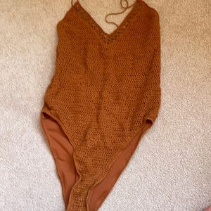 Rust orange body suit